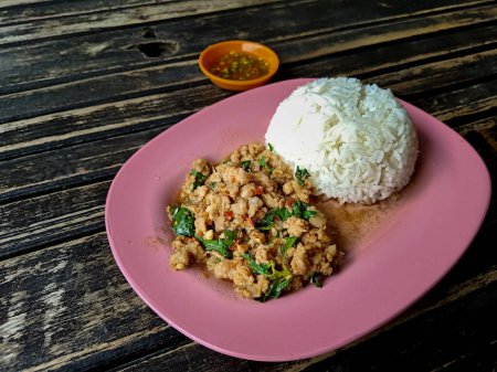 Photo for Rice topped with stir-fried pork and basil - Royalty Free Image