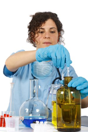 Photo for Young female laboratory assistant working at lab - Royalty Free Image