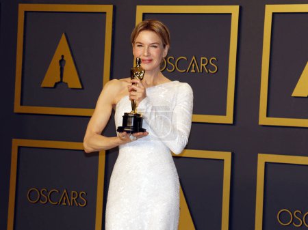 Téléchargez les photos : Renée Zellweger posant lors de la remise des Oscars - en image libre de droit