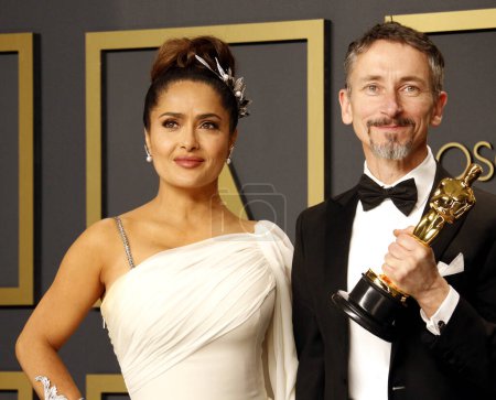 Photo for Salma Hayek, Mark Taylor posing at the Academy Awards presentation - Royalty Free Image