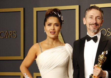 Photo for Mark Taylor, and Salma Hayek posing at the Academy Awards presentation - Royalty Free Image