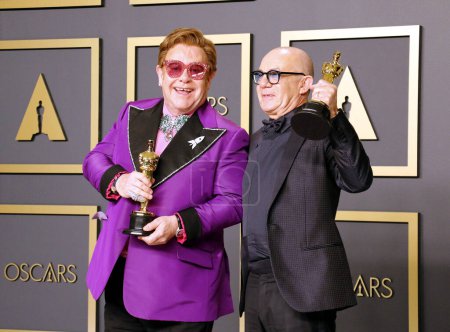 Photo for Elton John, Bernie Taupin posing at the Academy Awards presentation - Royalty Free Image