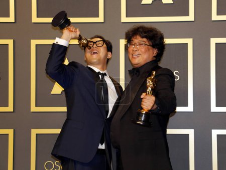 Photo for Han Jin-won, Bong Joon-ho posing at the Academy Awards presentation - Royalty Free Image
