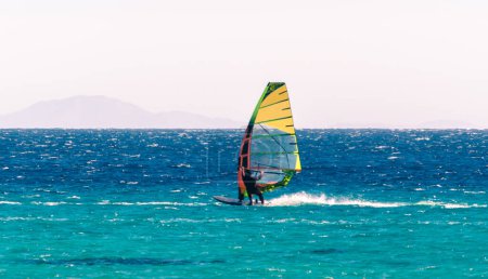Photo for One surfer rides in the Red Sea in Egypt - Royalty Free Image