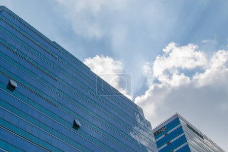 Photo for Glass office building with blue sky - Royalty Free Image