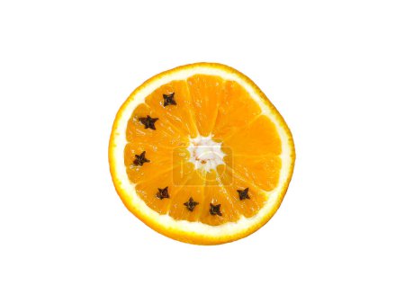 Photo for A slice of navel orange with cloves - Royalty Free Image