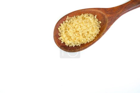 Photo for Brown sugar and a wooden spoon" - Royalty Free Image