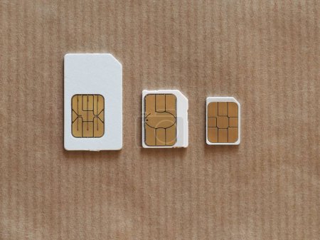 Photo for Mini micro and nano sim on background, close up - Royalty Free Image