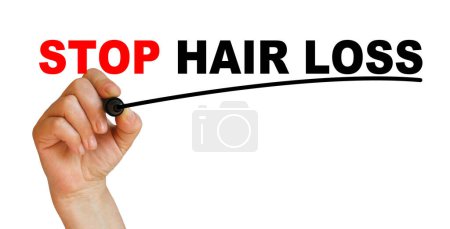 Foto de Escritura detener la pérdida de cabello en pizarra - Imagen libre de derechos