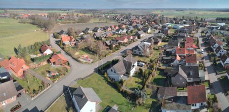 Photo for Aerial panorama of a small village in the Lneburger Heide near Hamburg, aerial view - Royalty Free Image