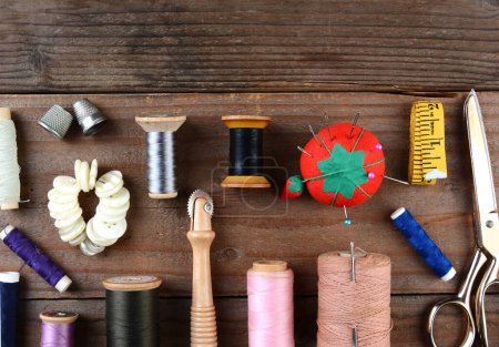 Photo for Sewing Tools on wooden background - Royalty Free Image