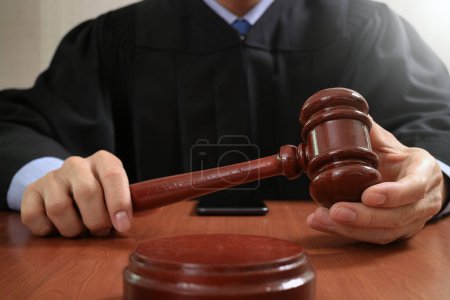 Photo for Justice and law concept.Male judge in a courtroom striking - Royalty Free Image
