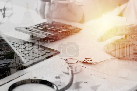 Photo for Healthcare costs and fees concept.Hand of smart doctor - Royalty Free Image