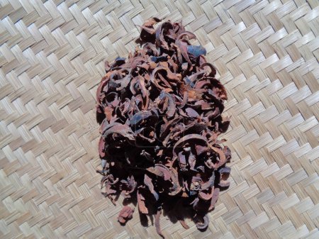 Photo for Dried mangosteen (Garcinia mangostana, purple mangosteen, manggis) peel. Mangosteen rind used as herbal medicine - Royalty Free Image