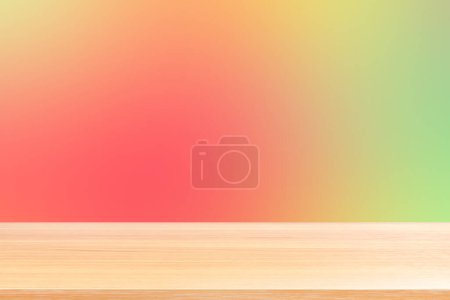 Foto de Empty wood table floors on gradient red and green soft background, wood table board empty front colorful gradient, wooden plank blank on light red gradient for display products or banner advertising - Imagen libre de derechos