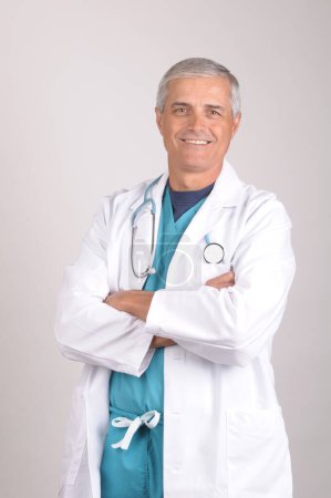 Photo for Smiling Mature Doctor in Lab Coat. Healthcare and medicine concept - Royalty Free Image