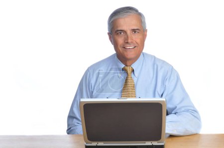 Photo for Businessman with Laptop Computer at Dest - Royalty Free Image