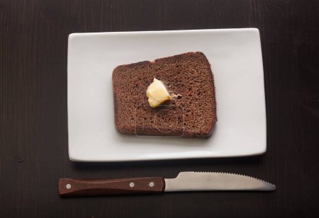 Photo for Toasted custard rye bread on the white plate - Royalty Free Image
