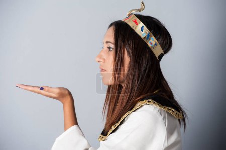 Photo for Young girl posing in egyptian clothing - Royalty Free Image