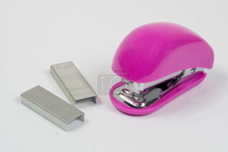Photo for Small Pink Stapler on white background - Royalty Free Image