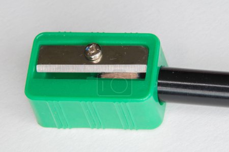 Photo for Green pencil sharpener on the white background - Royalty Free Image