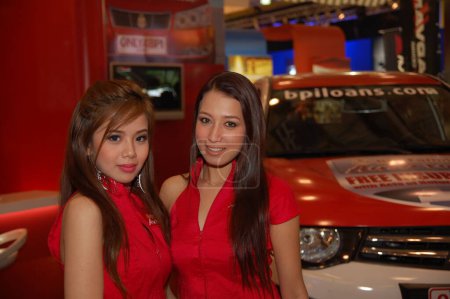 Foto de "BPI family auto loan female model at 8th Manila International Au" - Imagen libre de derechos