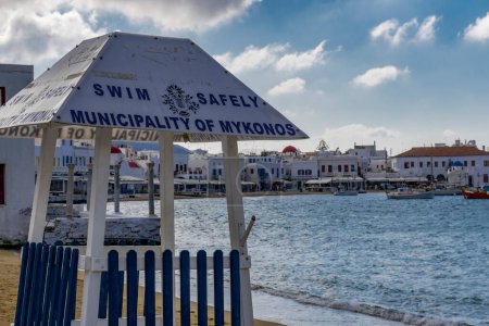 Photo for "Mykonos, Greece swim safely sign on the beach." - Royalty Free Image