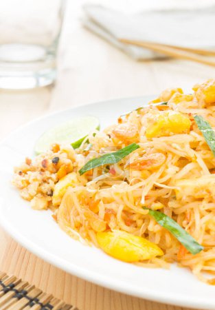 Photo for Pad Thai or Thai Fried Noodle on Wood Table - Royalty Free Image