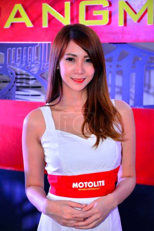Foto de Motolite coche batería modelo femenino en Manila Internacional Auto Show - Imagen libre de derechos