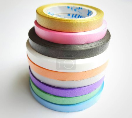 Photo for Multi colored curling ribbons on white background - Royalty Free Image