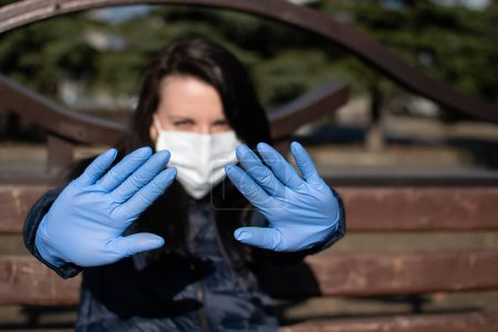 Photo for Hands of a girl in rubber medical gloves - Royalty Free Image