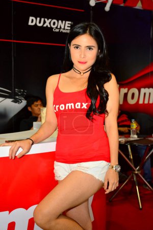 Photo for "Cromax female model at Trans Sport Show in Pasay, Philippines - Royalty Free Image