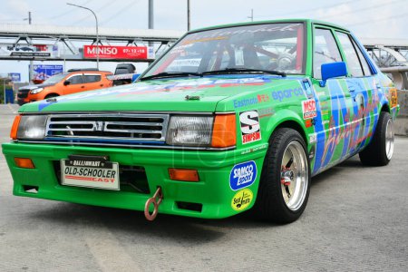 Photo for "Mitsubishi lancer at Royals Auto Moto Show in Marikina - Royalty Free Image