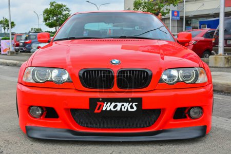 Photo for "BMW red car at Royals Auto Moto Show in Marikina, Philippines" - Royalty Free Image