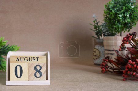 Photo for "August 8 on table background, close up - Royalty Free Image