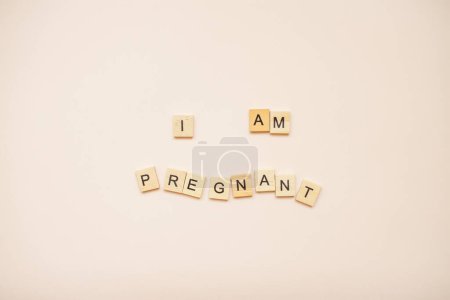 Téléchargez les photos : L'inscription "Je suis enceinte" - en image libre de droit
