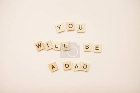 Foto de La inscripción "serás un padre" - Imagen libre de derechos
