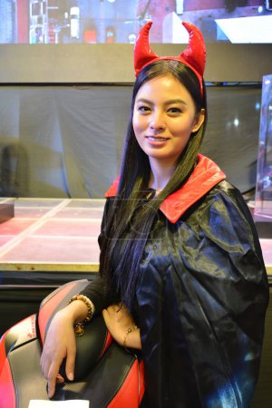 Foto de Diablo modelo femenino en Inside Racing Motor Bike Show en Pasay, Filipinas - Imagen libre de derechos