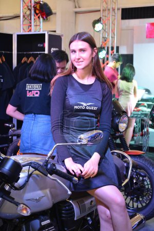 Photo for Motorcycle female model at Philippine Moto Heritage Weekend - Royalty Free Image