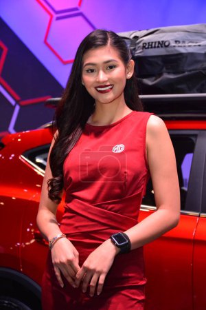 Photo for Morris Garages female model at Manila International Auto Show - Royalty Free Image