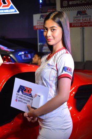 Photo for R33 female model at 25th Trans Sport Car Show in Pasay - Royalty Free Image