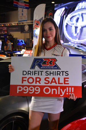 Photo for R33 female model at 25th Trans Sport Car Show in Pasay, - Royalty Free Image