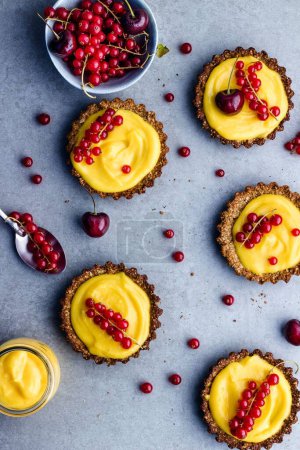 Photo for "lemon curd tart with berries" - Royalty Free Image