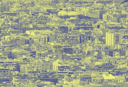 Photo for Blue and yellow duotone crowded urban cityscape background with hundreds of densely packed buildings - Royalty Free Image