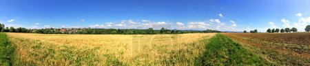 Photo for Panoramic view over stubble field and acre in summer - Royalty Free Image