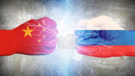 Photo for China vs Russia flags on fists - Royalty Free Image