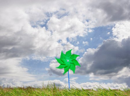 Photo for Pinwheel against cloudy sky - Royalty Free Image