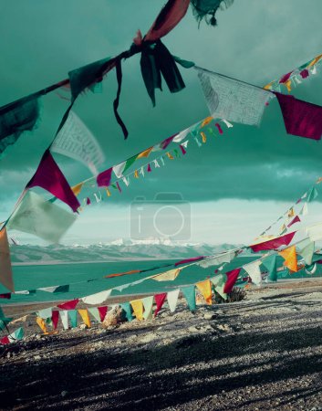 Photo for Prayer Flags by Lake near mountains - Royalty Free Image