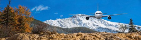 Photo for Airplane frying over the Snow Mountain background - Royalty Free Image