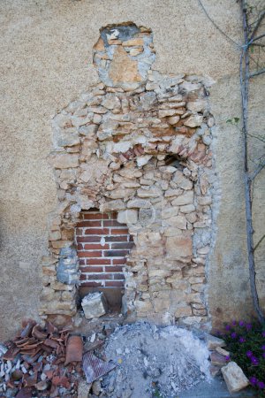 Photo for "View of damaged stone wall" - Royalty Free Image